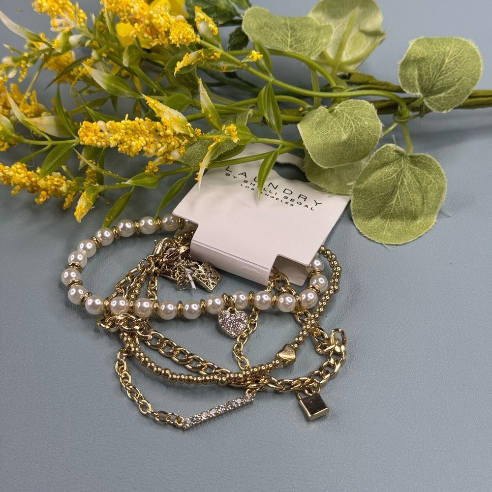 Laundry By Shelli Segal Gold and White 4 piece Bracelet Set
